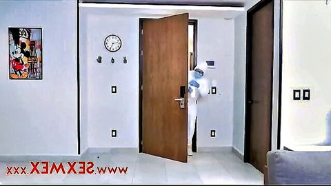 Step mom in white outfit peeking teasingly at son in quarantine