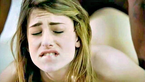 Blonde woman intense orgasm face in doggystyle sex close-up