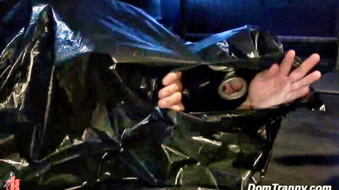 Latex TS Jamie French dominates bound man in plastic and gas mask