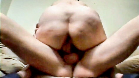 Fair-skinned guy spreads wide ass cheeks exposing tight pink asshole and hanging balls closeup