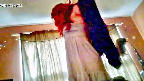Amateur redhead princess in flowy dress hanging jacket solo homemade