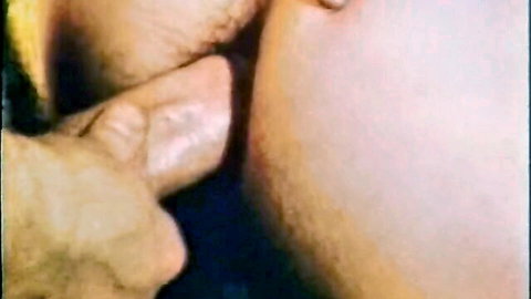 Hairy man's fingers spreading and penetrating woman's wet hairy pussy closeup