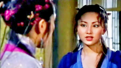 Two Asian women in traditional dresses facing off in Kim Bình Mai 1996 scene