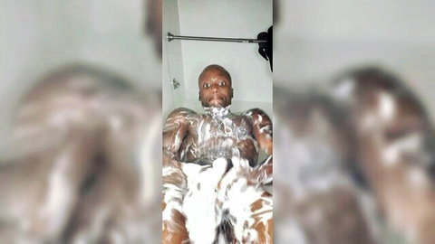 Muscular black teen soaping uncut BBC in steamy shower POV 4K