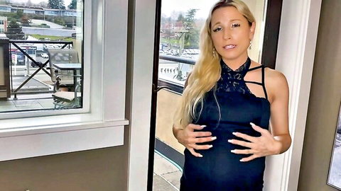 Blonde pregnant neighbor in sexy black lace dress, teasing pose