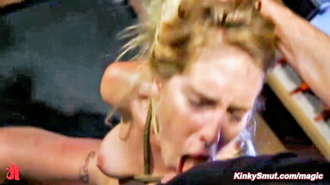 Blonde submissive deepthroats big cock with hand gagging her mouth in rough BDSM scene
