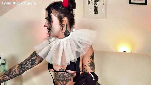 Lydia Black sexy clown angel in revealing lingerie and tattoos