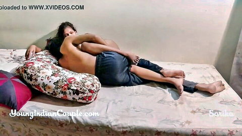 Young Indian teenie couple in intimate spooning embrace
