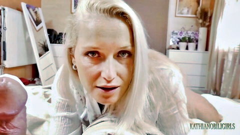 Busty blonde stepmom in white blouse seduces on bed, POV tease