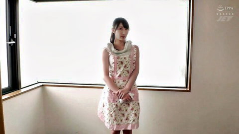 Japanese woman in cute pink floral dress and neck brace by window