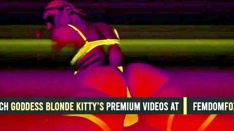 Blonde Kitty posing in yellow lingerie, big ass view