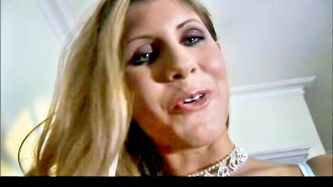 Jennifer Stone blonde beauty in close-up with diamond necklace and glossy lips