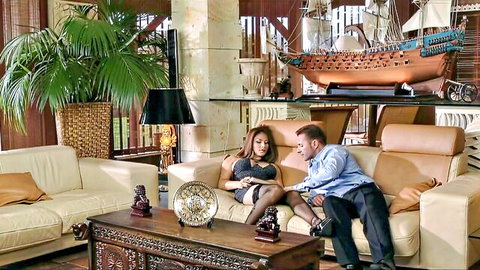 Roberta Gemma Italian MILF in black dress and stockings with man on couch
