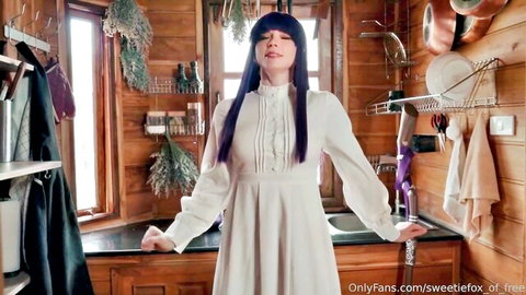 Sweetie Fox in ruffled white dress posing seductively in kitchen, OnlyFans