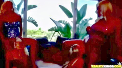 Two busty blondes in sparkly dresses smoking seductively in Smoking Divas by Reality Kings