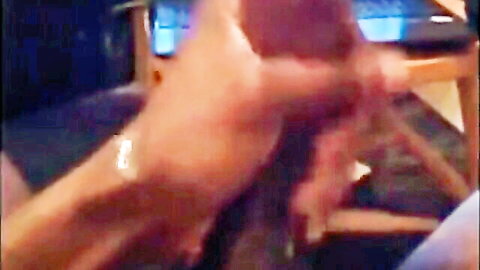 Hairy hand gripping thick erect cock in blurry amateur handjob closeup