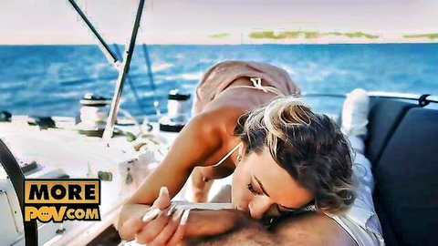 Blonde babe in bikini gives handjob and kisses throbbing cock on luxury yacht deck POV