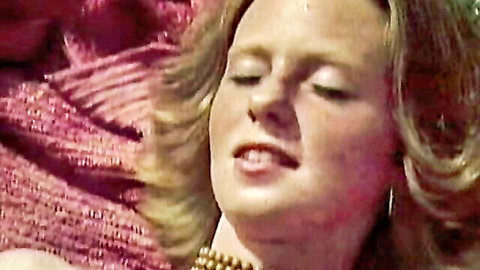Blonde retro pornstar in ecstasy close-up, vintage 80s adult video thumbnail