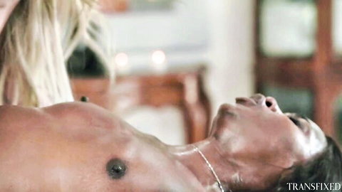 Jade Venus topless blonde trans model in intimate scene, Transfixed