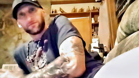 Tattooed bearded white guy in amateur gay handjob and pig play scene
