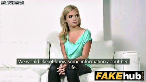 Shy blonde European model in green top during casting interview