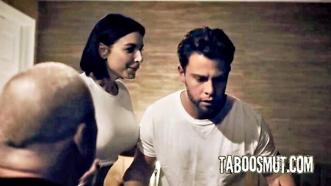 Brunette in white top with two men in teacher-student watch scene