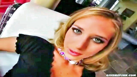 Horny blonde babe in black top teases with seductive gaze for toy play