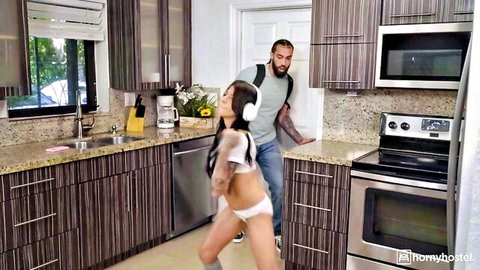 Petite Asian teen in sheer top showing small tits and panties bends over as Black DILF grabs her in kitchen