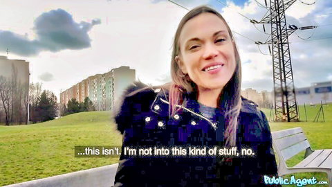 Alyssa Reece smiling outdoors in furry jacket, teasing reluctance