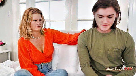 50yo Reya Lovenlight as mature stepmom embraces stepson in orange top