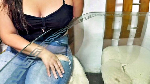 Curvy Latina wife with large butt and big cleavage in black top and ripped jeans