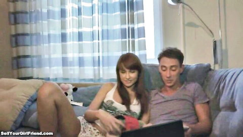 Homemade girlfriend spreads legs on couch holding red panties watching laptop with boyfriend