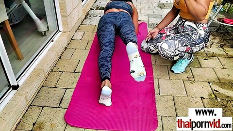 Thai cougar and girlfriend workout on dildo in leggings and socks