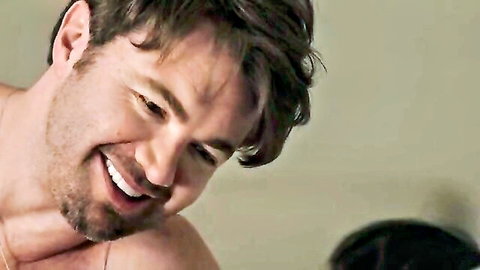 Shirtless man smiling in hot pool scene from Danni Suzuki's Secrets (2024)