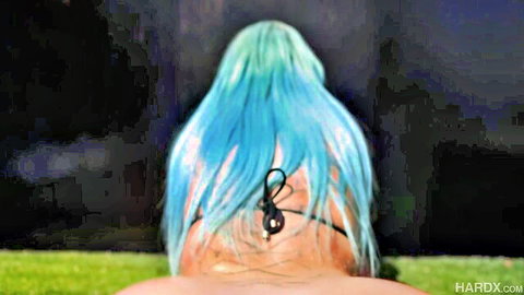 Nina Kayy with blue hair in black bikini by pool