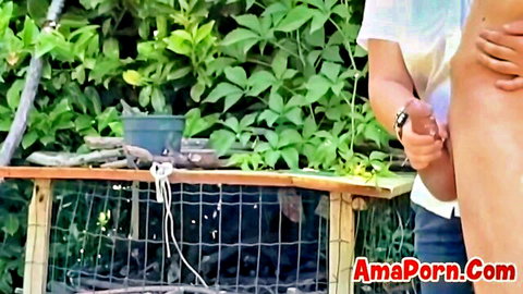 Outdoor amateur handjob with cumshot in spring garden