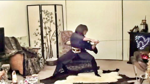Latia Del Riviero in sexy martial arts kata dance, tight black outfit