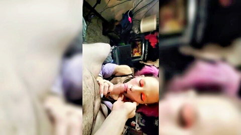 Pink-haired girlfriend deepthroats huge cock in rough homemade face fuck POV