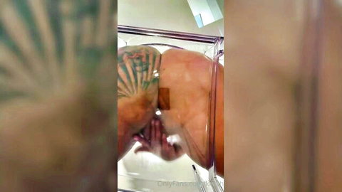KKVSH twerking big tattooed ass in shower thong, curvy Latina solo tease