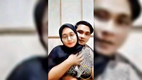 Diah Asnawi in hijab embracing lover intimately, Indo couple tease