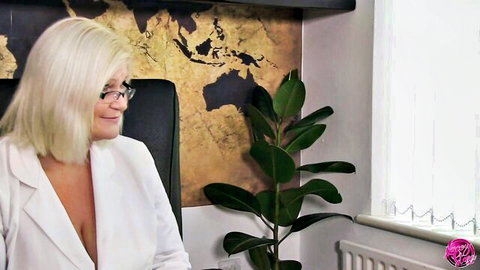 Dr. Lacey blonde in low-cut white blazer, teasing cleavage in office