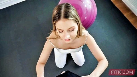 Rebecca Volpetti kneeling in tight white outfit, blonde teen fitness tease