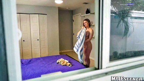 Sydney Paige blonde MILF wrapped in towel, teasing nude body solo