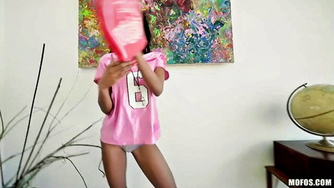Ebony Nia Nacci teasing in pink jersey and panties