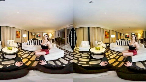 Blonde curvy babe with huge tits spreads legs wide on luxury hotel sofa in VR