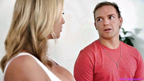 Busty blonde MILF Rachael Cavalli in cleavage-revealing top with man