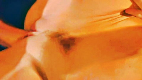 Blurry close-up of mature cougar's intimate area with pubic hair