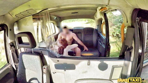 Max Deeds pounds redhead passenger in steamy Fake Taxi ride