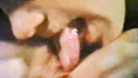 Close-up of woman performing intense blowjob in classic Smaragd Film anal sex scene