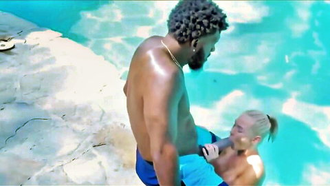 Blonde babe in pool strokes huge BBC of muscular black stud poolside